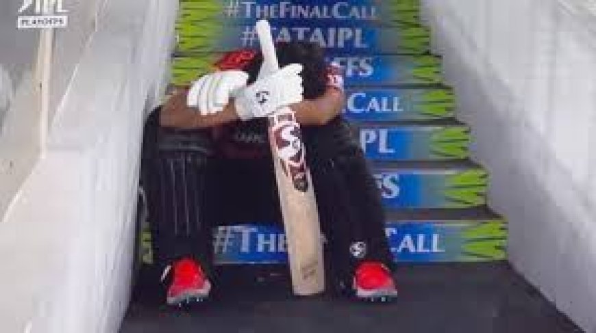 After a disastrous run-out in  Qualifier 1, Rahul Tripathi sobs on the stairs.